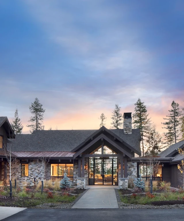 Tate Interiors Montana Interior Design Beargrass Chalet Front Entrance Dusk Exterior
