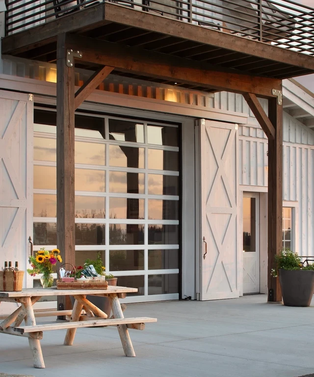 Tate Interiors Montana Interior Design Hawks Homestead Barn Entrance Glass Door Picnic Table