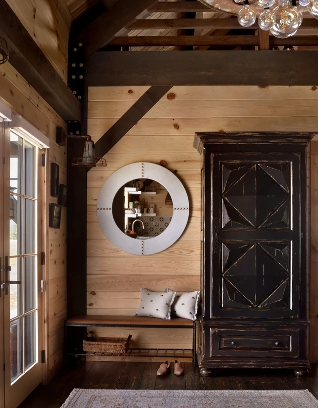 Tate Interiors Montana Interior Design Hawks Homestead Entry Armoire Round Mirror