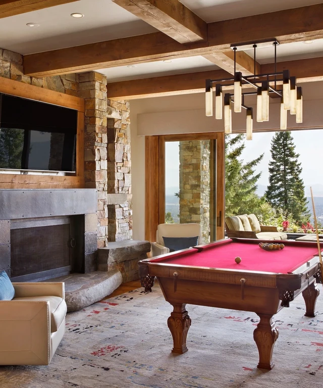 Tate Interiors Montana Interior Design Iron Horse Vacation Home Game Room Pool Table Stone Fireplace