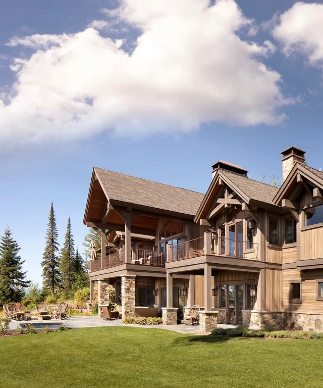 Tate Interiors Montana Interior Design Iron Horse Vacation Home Rear Exterior Wood Stone Deck