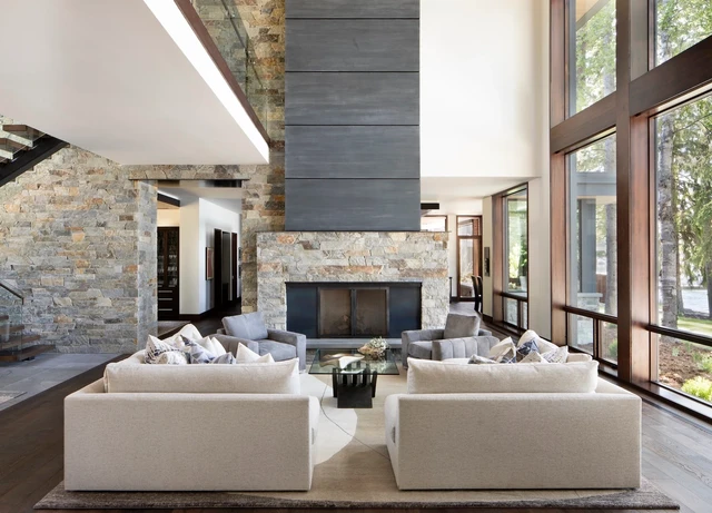 Tate Interiors Montana Interior Design Montana Lake House Living Room Stone Fireplace Floor To Ceiling Windows