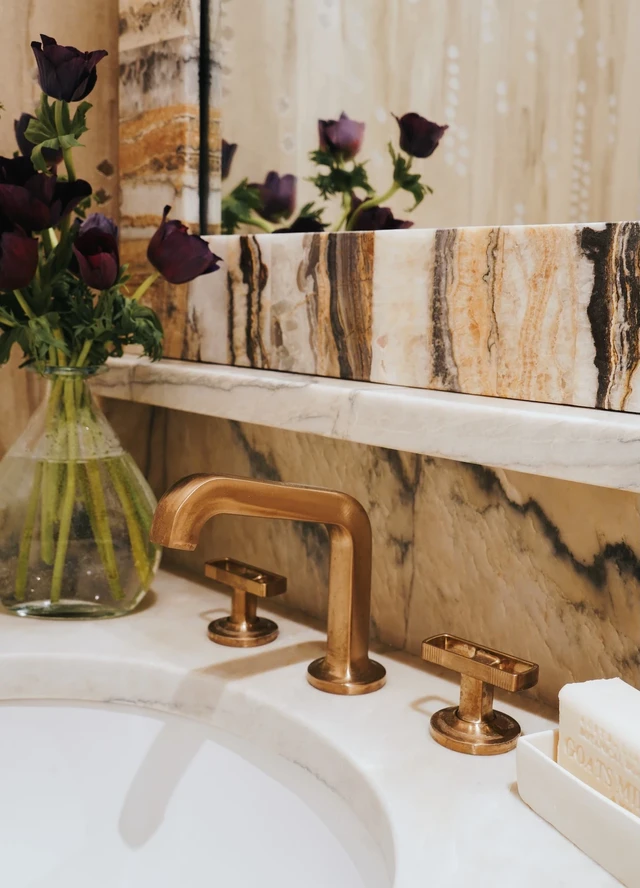 Tate Interiors Montana Interior Design Moose Crossing Bathroom Detail Onyx Stone Brass Faucet