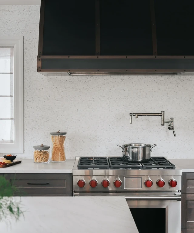 Tate Interiors Montana Interior Design Moose Crossing Kitchen Range Stone Backsplash