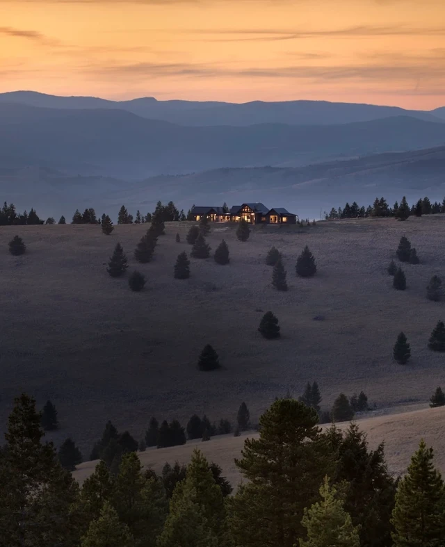 Tate Interiors Montana Interior Design Pintler Shadows Aerial View House On Hillside Dusk