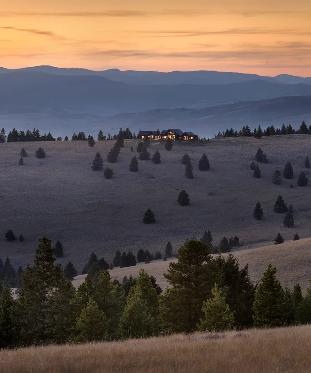 Tate Interiors Montana Interior Design Pintler Shadows Aerial View House On Hillside Dusk